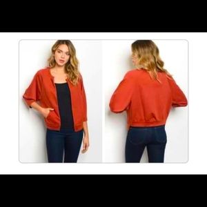 Rust 3/4 sleeve open front blazer cardigan.